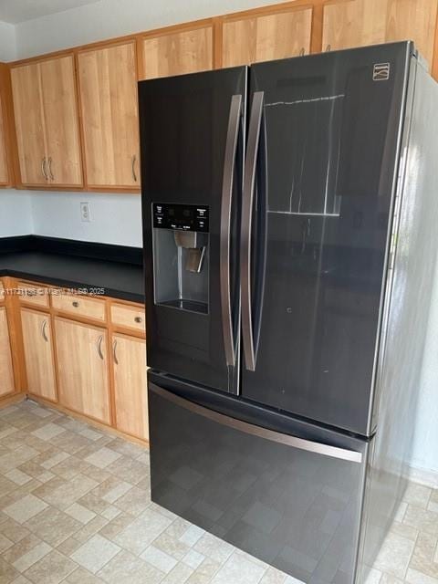 kitchen with stainless steel fridge with ice dispenser