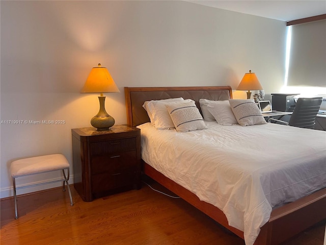 bedroom featuring hardwood / wood-style floors