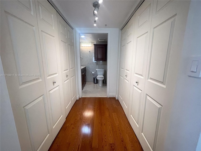 hallway featuring dark hardwood / wood-style floors