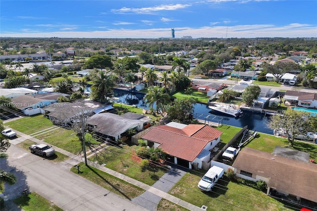 aerial view with a residential view and a water view