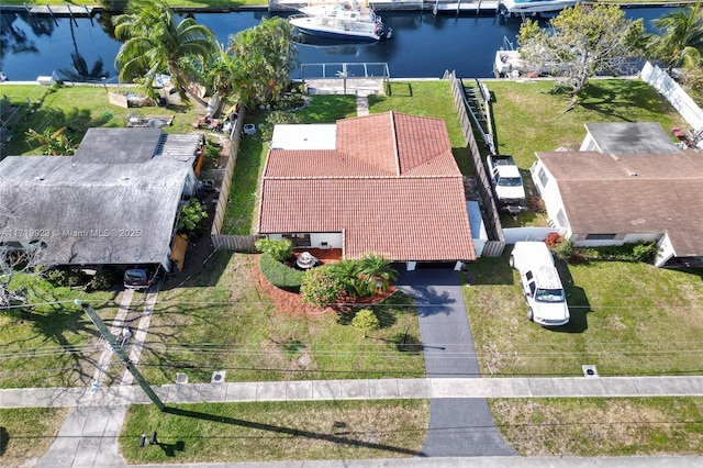 drone / aerial view with a water view