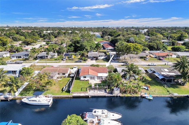 aerial view featuring a residential view and a water view