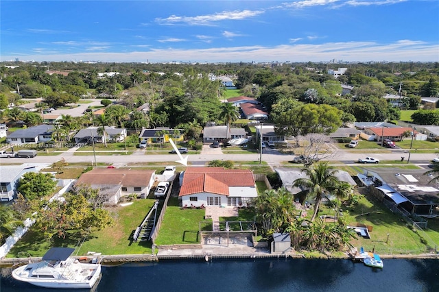 aerial view featuring a residential view and a water view