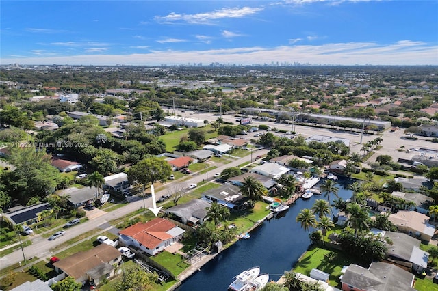 aerial view with a water view and a residential view