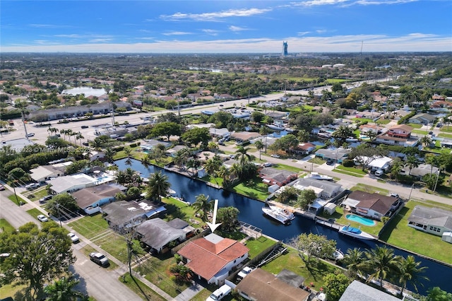 aerial view with a water view and a residential view