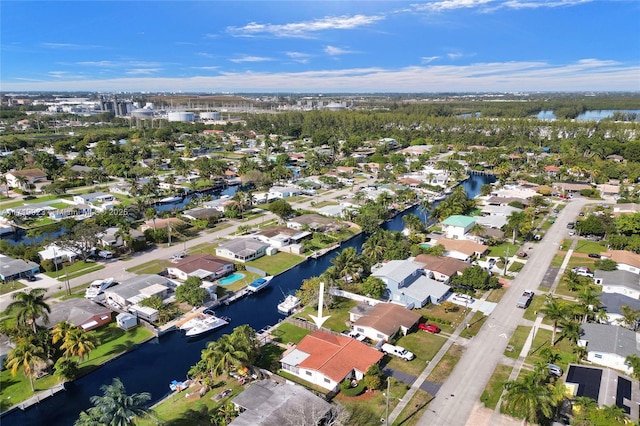 bird's eye view featuring a residential view and a water view