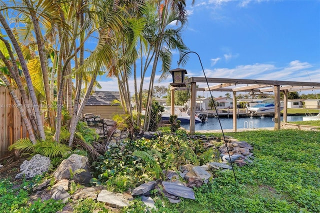 dock area featuring a water view