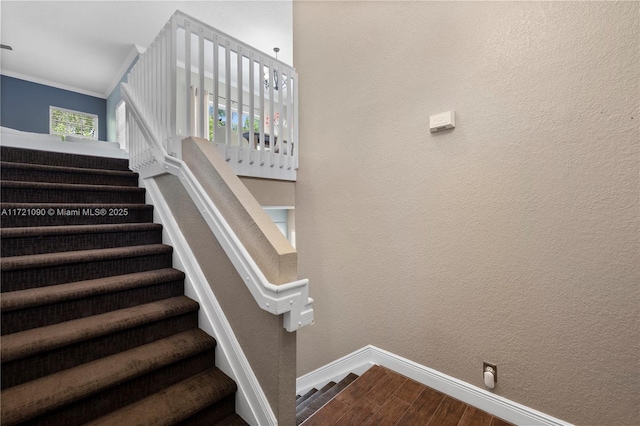 stairs featuring ornamental molding