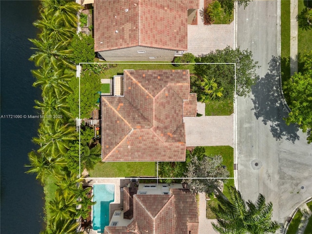 drone / aerial view with a water view