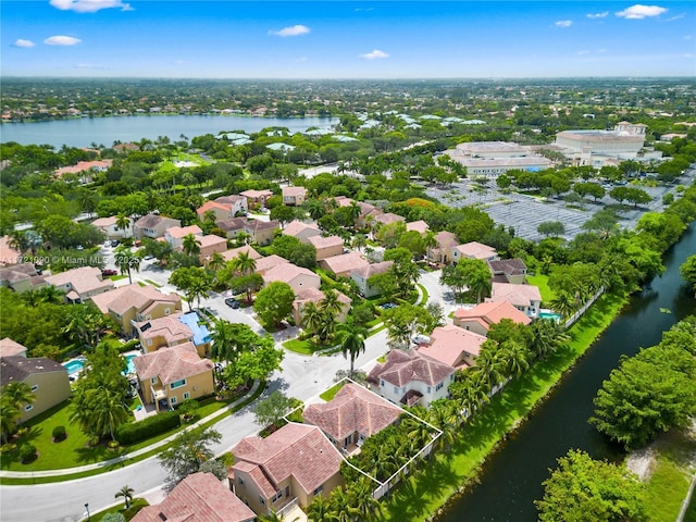 bird's eye view with a water view