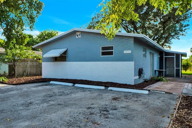 view of home's exterior with a patio area