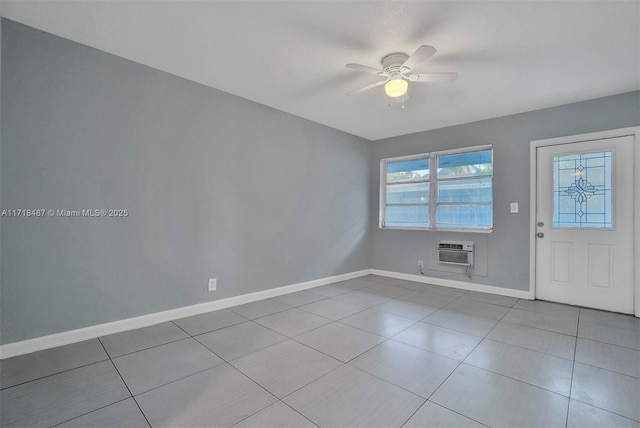 tiled entrance foyer featuring ceiling fan and an AC wall unit