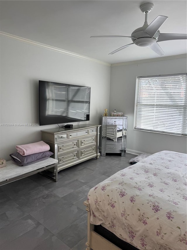 bedroom featuring crown molding and ceiling fan