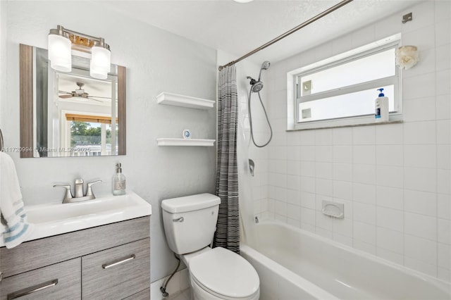 full bathroom featuring vanity, toilet, shower / bathtub combination with curtain, and ceiling fan