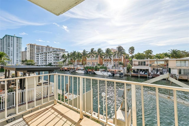 balcony featuring a water view