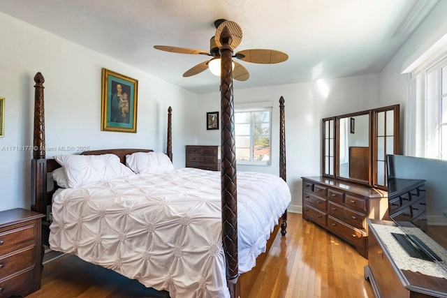 bedroom featuring ceiling fan and light hardwood / wood-style flooring