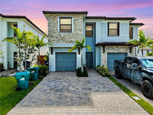 view of front of house with a garage