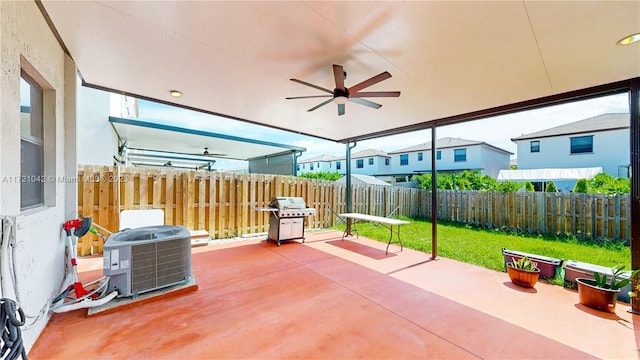 view of patio with a grill, ceiling fan, and cooling unit