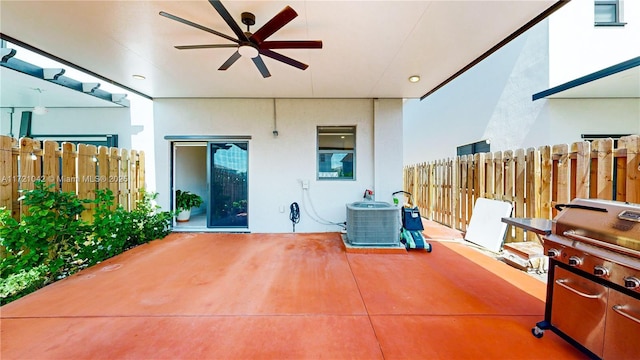 view of patio featuring central AC and ceiling fan