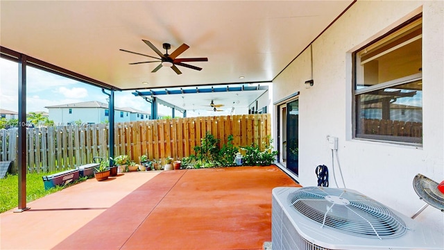 view of patio / terrace with ceiling fan and cooling unit