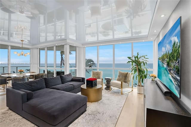 sunroom with a chandelier