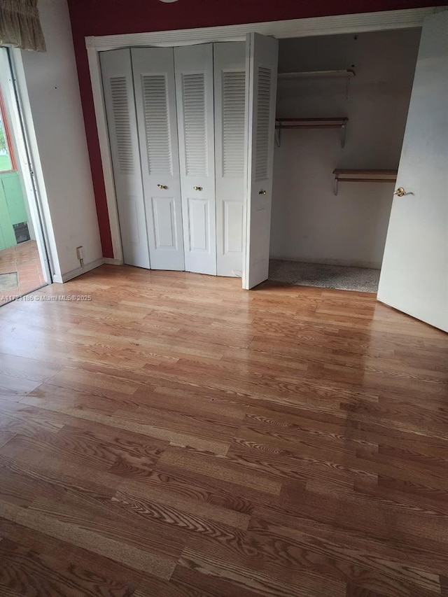 unfurnished bedroom featuring light hardwood / wood-style flooring