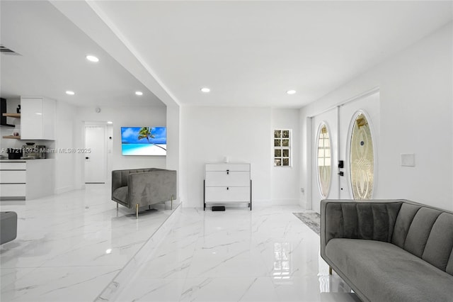 571 Raven Ave, Miami Springs, FL 33166 - living room with visible vents, recessed lighting, and marble finish floor