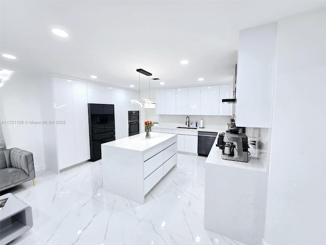 kitchen featuring black appliances, white cabinets, decorative light fixtures, a kitchen island, and sink