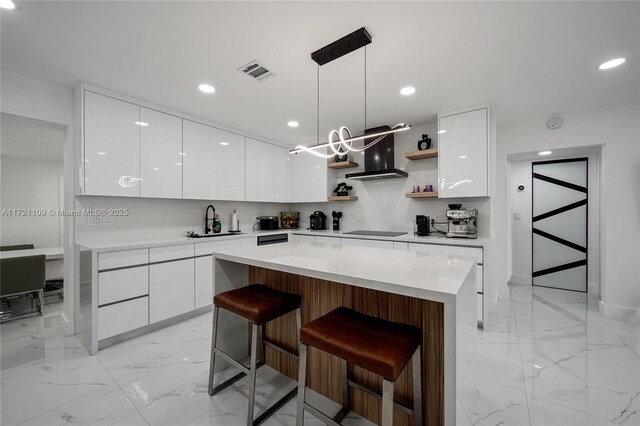 571 Raven Ave, Miami Springs, FL 33166 - kitchen featuring a sink, modern cabinets, open shelves, wall chimney exhaust hood, and visible vents
