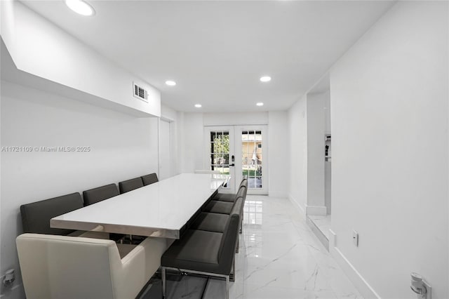 571 Raven Ave, Miami Springs, FL 33166 - dining room featuring recessed lighting, marble finish floor, visible vents, baseboards, and french doors