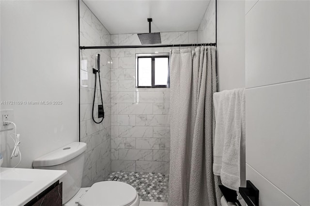 571 Raven Ave, Miami Springs, FL 33166 - bathroom with toilet, a stall shower, and vanity