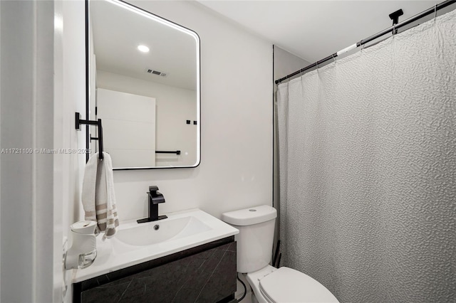 571 Raven Ave, Miami Springs, FL 33166 - bathroom featuring vanity, toilet, and visible vents