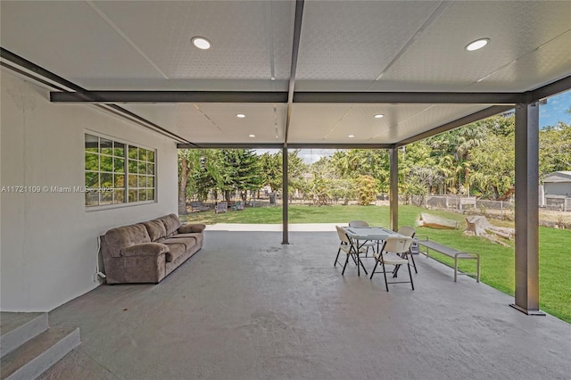 571 Raven Ave, Miami Springs, FL 33166 - view of patio / terrace featuring fence and outdoor dining area