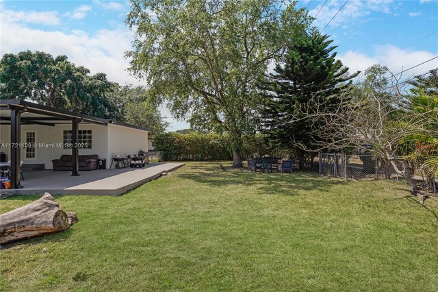571 Raven Ave, Miami Springs, FL 33166 - view of yard featuring a patio and fence