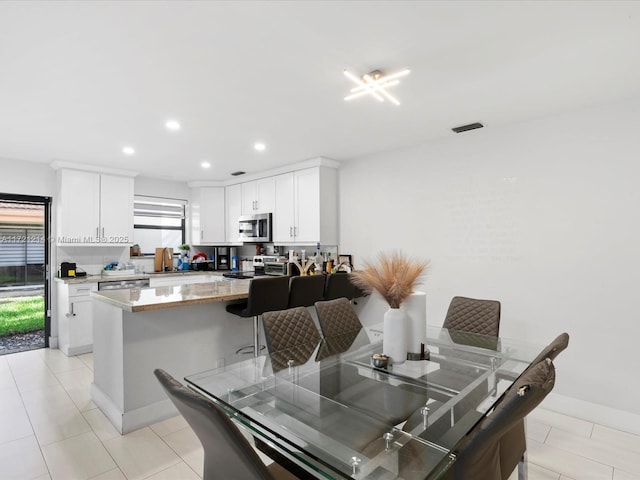 view of tiled dining room