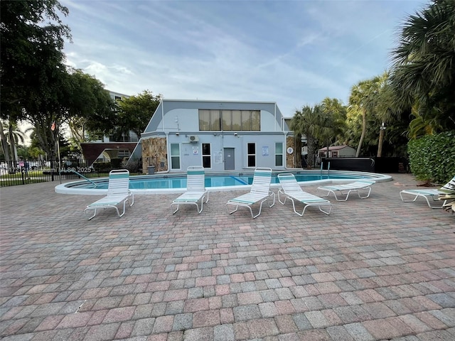 view of pool featuring a patio