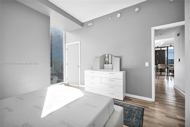 bedroom featuring hardwood / wood-style floors