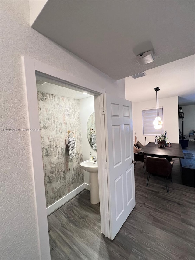 bathroom featuring hardwood / wood-style flooring