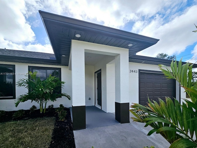 entrance to property with a garage