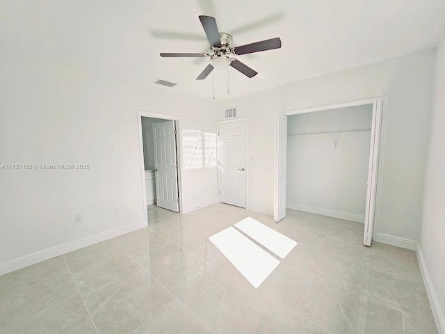 unfurnished bedroom featuring ceiling fan