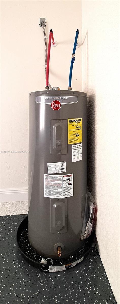 utility room with water heater