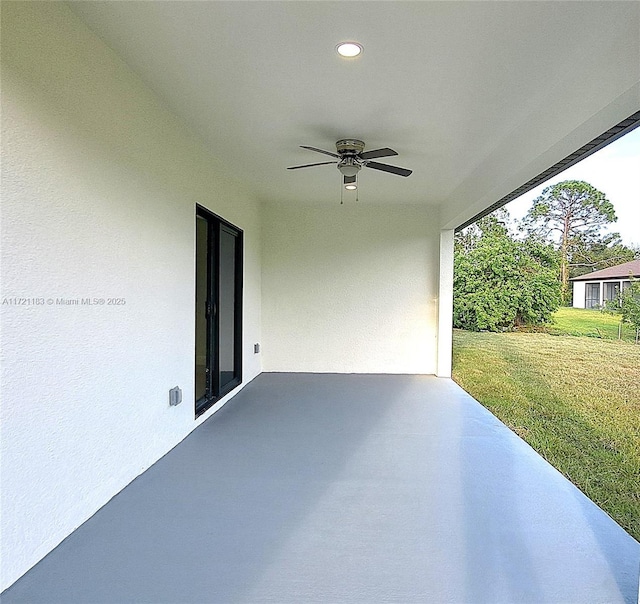 view of patio with ceiling fan