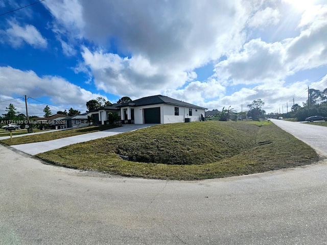 view of side of home with a garage