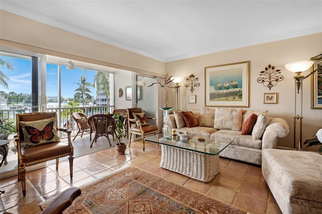 living room with tile patterned floors and crown molding