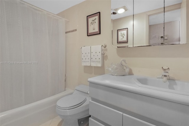 full bathroom featuring shower / bathtub combination with curtain, tile patterned flooring, vanity, and toilet