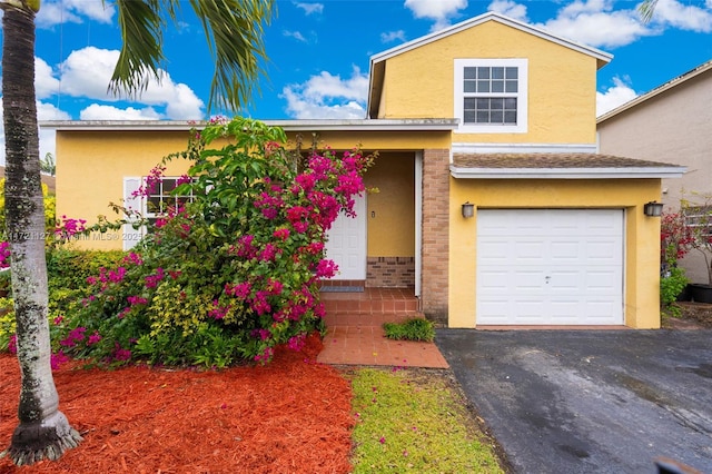 view of front of property featuring a garage