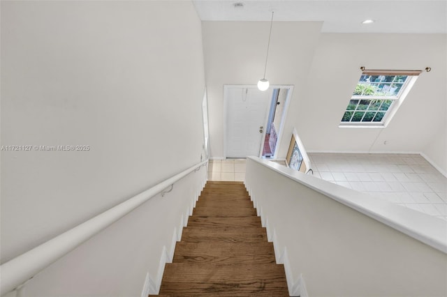 stairway featuring tile patterned floors