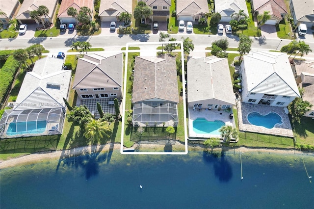 bird's eye view with a water view