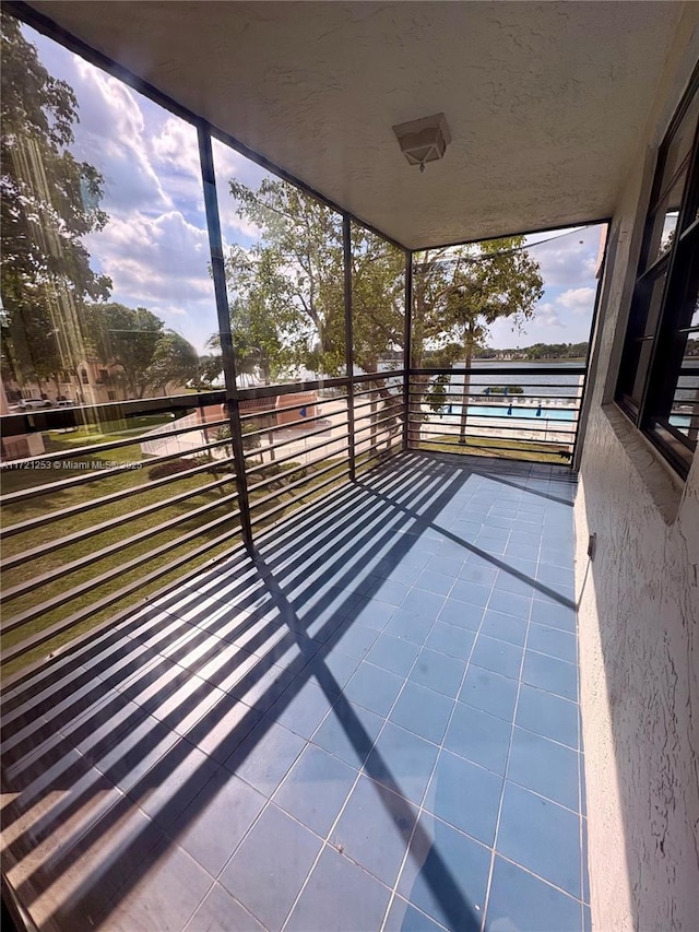 balcony featuring a sunroom