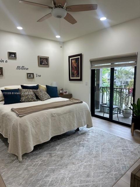 bedroom featuring ceiling fan, access to outside, and light hardwood / wood-style floors